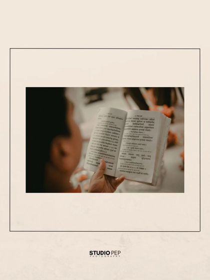 A shot focusing on the holy book being read during the ceremony, highlighting the importance of tradition and scriptures.