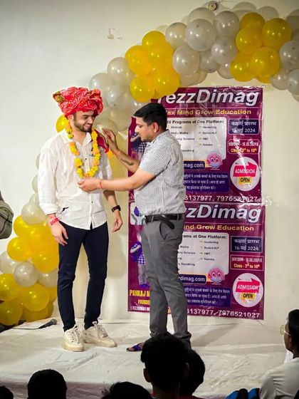 Being honored with a traditional Rajasthani 'pagdi' (turban) on stage in Kotputli. These moments reflect the deep connection we build with the local communities we serve.