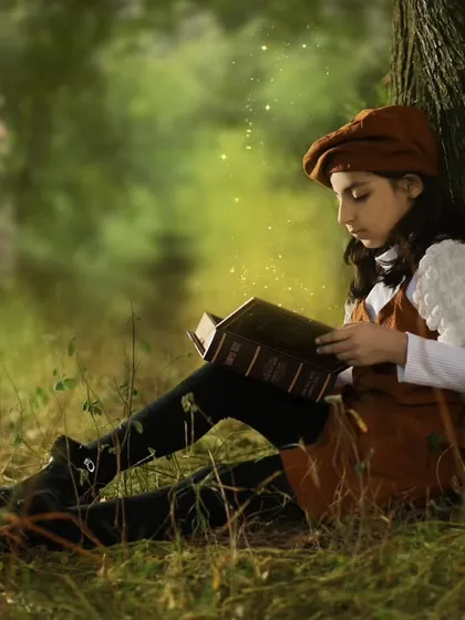 Another shot from my daughter's 7th birthday. The lighting and the quiet, thoughtful mood make this feel like a scene from a storybook.