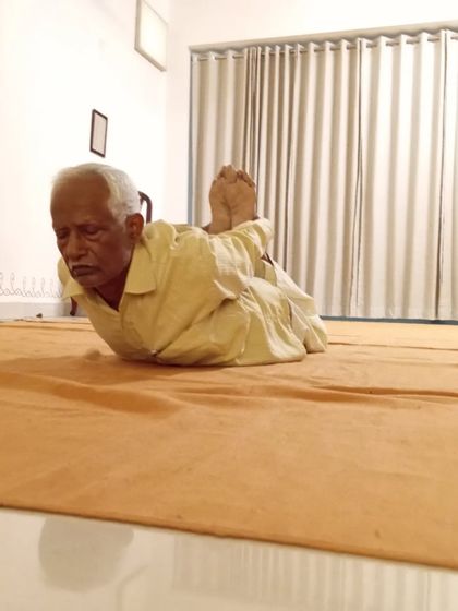 A deeper expression of Salabhasana, showcasing the strength built through consistent sadhana.