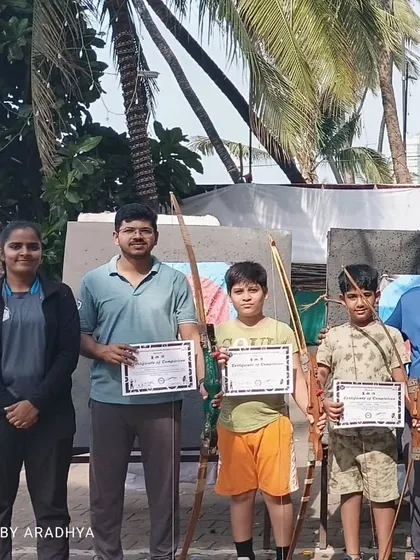 The November batch graduates, holding their certificates and bows. Congratulations to all of them on their achievement.