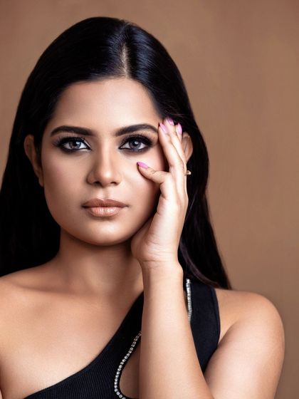 A direct and confident headshot with a focus on the eyes. This clean, professional style is perfect for actor and model portfolios, providing a clear and engaging look for casting directors.