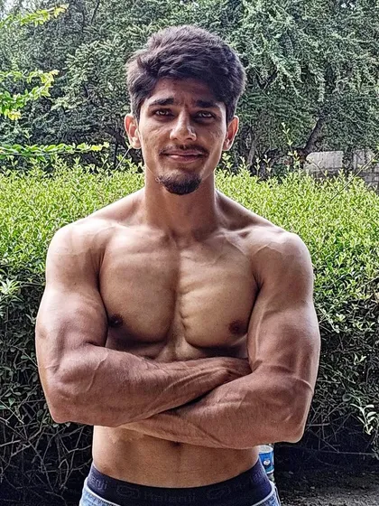 Another shot emphasizing the core and upper body physique that is a direct result of our holistic training methods.