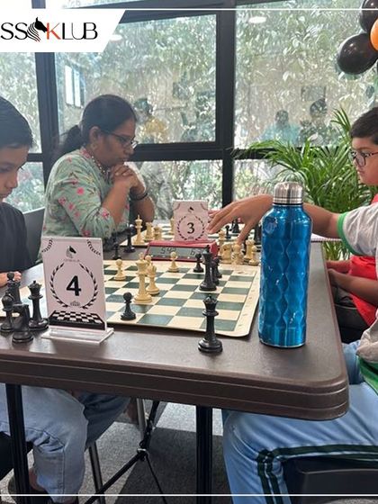 Players of all ages, from young children to adults, compete side by side at our JP Nagar center's opening tournament. Our events are designed to be inclusive for the entire chess community.