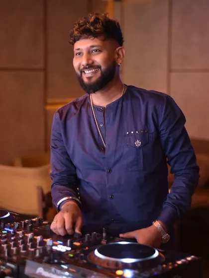 A smiling shot from the DJ booth. Happiness is a full dance floor.