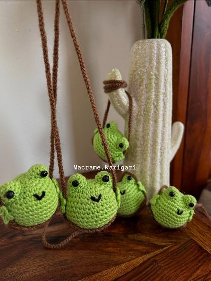 A group of our cheerful frog car charms ready to find new homes. Their smiling faces and cute design make them a popular choice for gifts or a personal treat.
