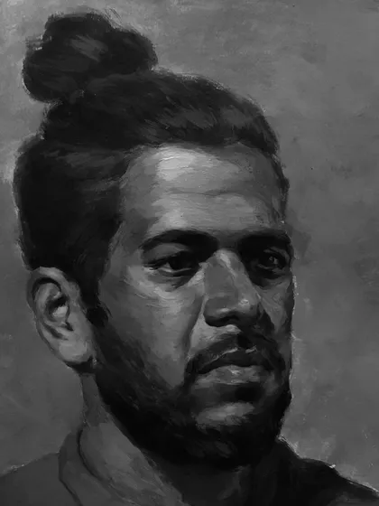 A black and white version of the "कोळी" portrait, emphasizing the strong light and shadow.