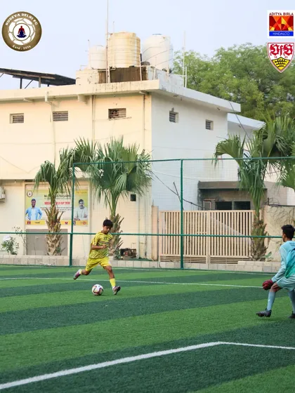 A player takes a shot on goal during a practice match. We create match-like situations in training to prepare our players for high-pressure moments.