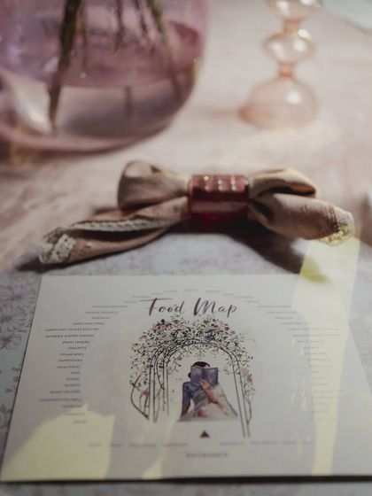 A detail shot of a custom menu from the castle reception, showing how even the stationery was designed to match the romantic, fairytale theme.