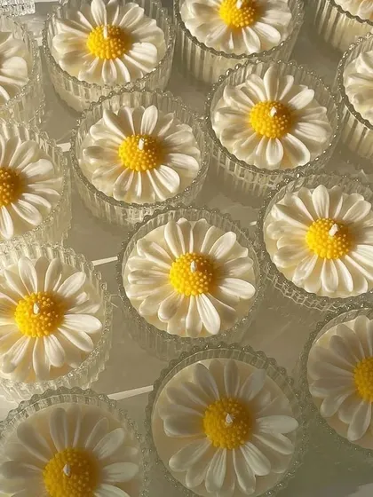 A closer look at our classic daisy candles. The simple yet beautiful design makes them a versatile gift for any occasion, from baby showers to 50th anniversaries.