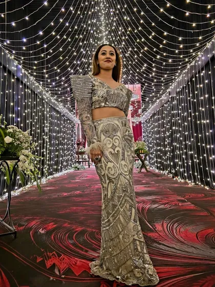 A full-length shot of my glamorous Ludhiana outfit. The structured shoulder and intricate sequin work made this a true showstopper.
