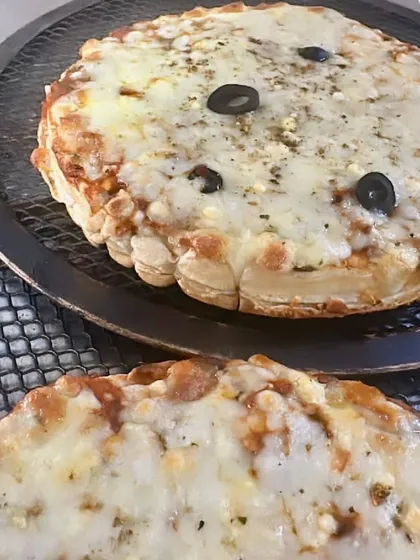 Our unique Waffle Pizza is a fun and creative dish that guests of all ages love. A savory waffle base is topped with pizza sauce, cheese, and olives for a delightful fusion snack.