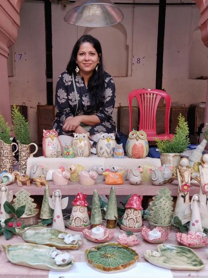 My stall at the Bhopal market, filled with a mix of my Christmas collection and my signature owl figurines.