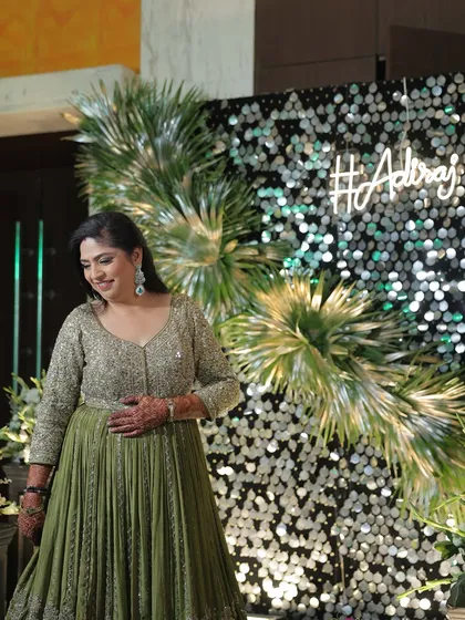 Styling for the family is one of my favorite parts of the job. Here’s my mom in a gorgeous green Anarkali for our pre-wedding function, proving that elegance is for everyone in the wedding party.