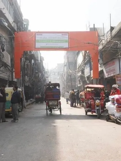 The entrance to Nai Sadak, or 'New Road', in Chandni Chowk. While now famous as a wholesale textbook market, it has a curious history of being a hub for opium and rain gambling in the 19th century.