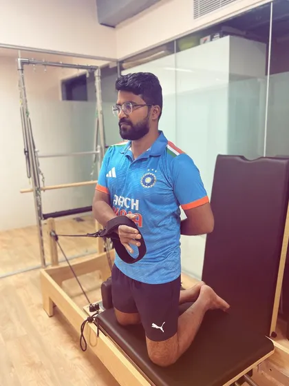 A demonstration of an external rotation exercise for the shoulder on the reformer. This movement is key for restoring function and preventing future rotator cuff injuries.