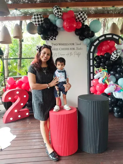 With the adorable birthday boy at his second birthday party. It's always a joy to be part of these happy family moments.