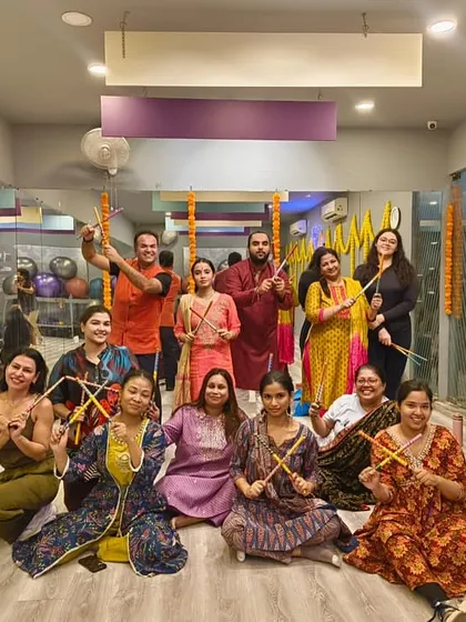 More smiles from our amazing crew during the Dandiya group class.