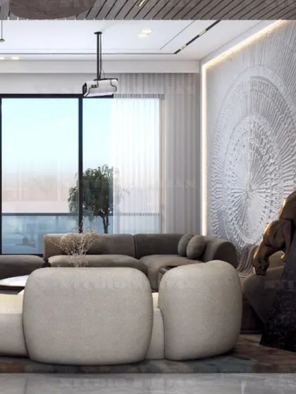 This angle shows the large window and the spacious layout of the lounge, making it a bright and inviting space during the day.