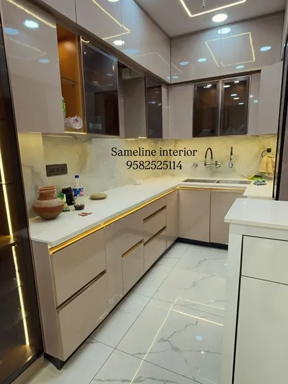 Another angle of the kitchen, showing the seamless integration of handleless drawers and cabinets, creating a clean and streamlined look.