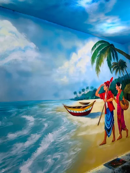 My Aagri Koli heritage is a deep source of inspiration. This mural captures a quiet moment on the shore, with a fisherman and his wife looking out at the sea. It’s more than a painting; it’s a story of my community and our connection to the water.