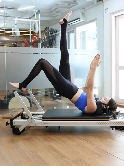 This is what it looks like when strength, balance, and control come together. On the reformer, we guide you through challenging movements that build long, lean muscles and a powerful core, helping you discover a new level of fitness and body awareness.