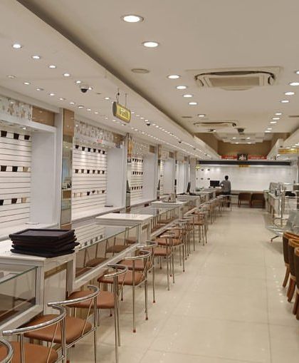 Studio 8 Designs - Commercial Interior Design Luxury Retail: Showcasing Brilliance photo 9