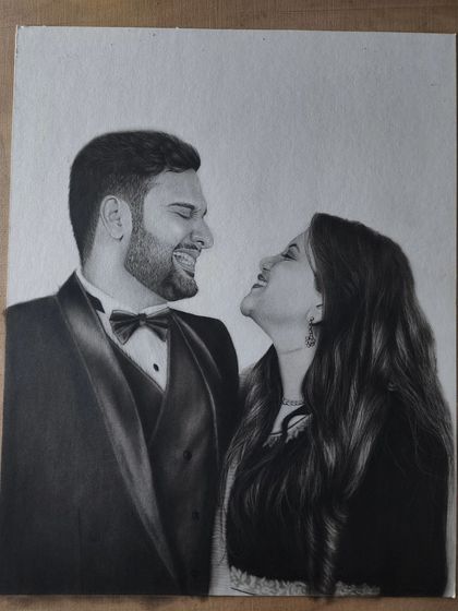The final unframed portrait of the laughing couple, showcasing the rich blacks of the tuxedo achieved with charcoal.
