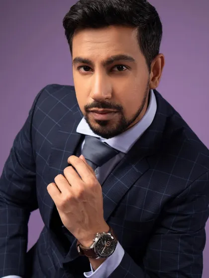 A professional headshot needs to convey confidence. Here, I used focused lighting and a simple pose to create a sharp, compelling portrait, perfect for a corporate profile or an actor's portfolio.