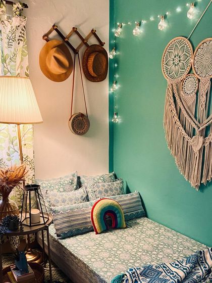 Be the dream catcher. We love how our large neutral macrame wall hanging and rainbow cushion complete this cozy and chic boho bedroom corner.