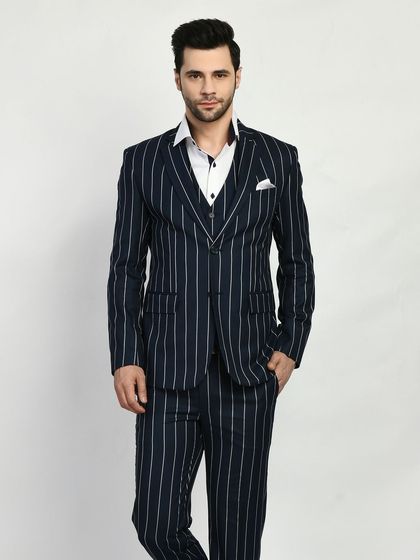 A bold navy pinstripe three-piece suit. The waistcoat adds a formal touch, making this a powerful choice for important meetings or presentations.