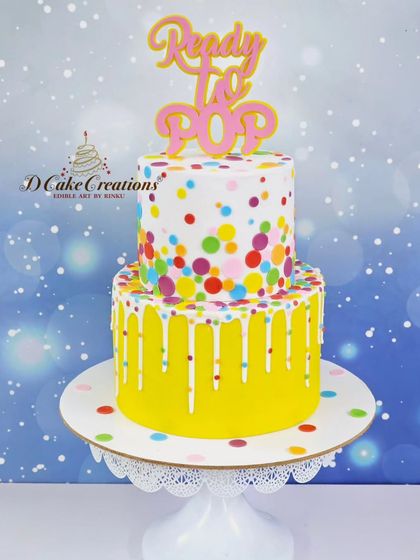 A studio shot of the cheerful "Ready to Pop" cake, perfect for a fun and modern baby shower celebration.