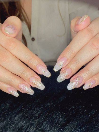 A full view of the elegant chrome-accented manicure.