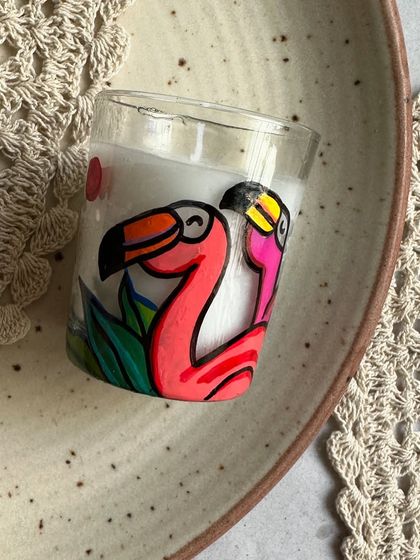 A close-up of the flamingo-themed candle, perfect for adding a pop of pink to your decor.