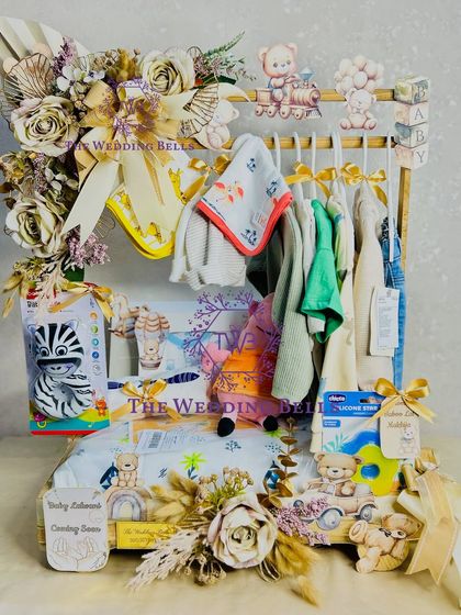 The full view of our beautiful baby shower wardrobe hamper. It's a gift that is both practical and stunningly presented.