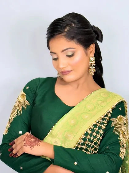 A close-up of the modern braided hairstyle, showing the clean lines and details.