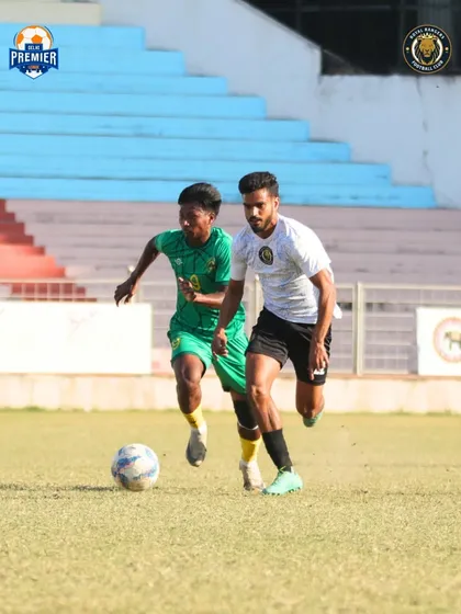 A fast-paced duel for the ball, highlighting the competitive spirit of our matches.