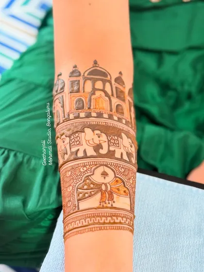A close-up of the Taj Mahal motif on the forearm, a popular request for brides who want to celebrate their Indian heritage.