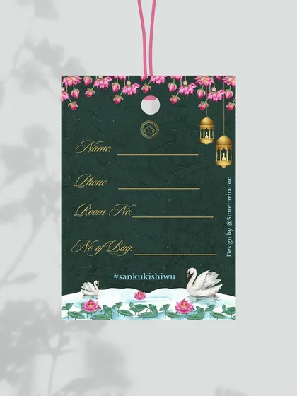 The reverse side of the lotus and swan themed luggage tag provides a practical and beautifully designed space for guests to write their contact information, ensuring the design is as functional as it is lovely.