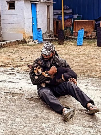 Just sitting on the ground, holding this little one. Sometimes they just need to be held to feel secure.
