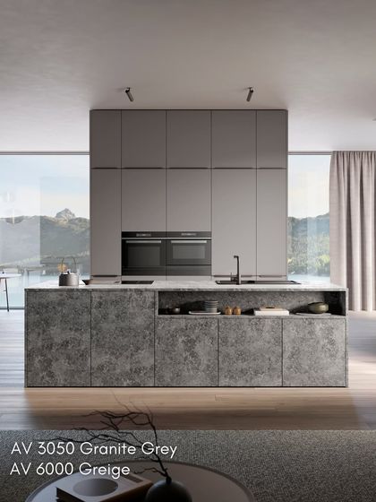 A statement in stone. This kitchen features granite-structured laminate fronts that look and feel like real stone, paired with soft matte greige cabinets for a grounded, quiet luxury.