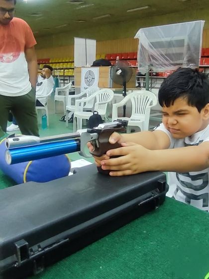 Using a pistol rest is a key part of our introductory training for young shooters. This technique helps them focus purely on aiming and trigger control without the physical strain of holding the pistol, building confidence and proper technique.