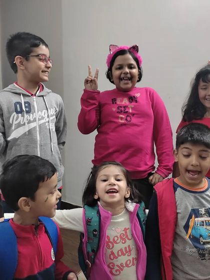 Every day is Children's Day here! The genuine happiness and playful energy in this group photo is what my program is all about.