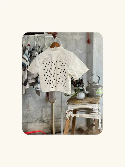 A piece from our new unisex collection, designed to celebrate World Water Day. This hand-painted top is made from organic Khadi and dyed with natural colors, with proceeds supporting local lake conservation.