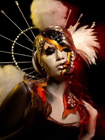 A fantasy portrait created by one of my talented students. The look is inspired by a butterfly, using textured elements, gold leaf, and dramatic lighting to create a magical effect.