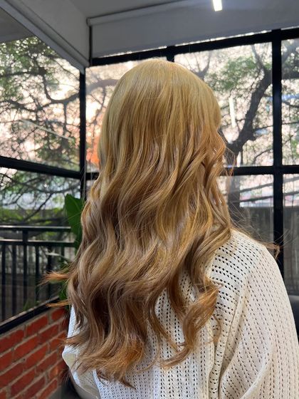 The back view of the sunset color, showcasing the soft waves and the seamless transition between the different warm tones.