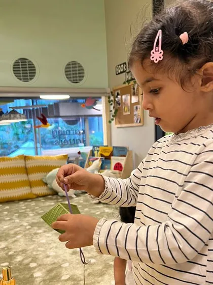Stringing flowers and leaves with a needle and thread is a beautifully focused fine motor task. It requires concentration, hand-eye coordination, and dexterity, while also introducing early mathematical concepts like counting and patterning.