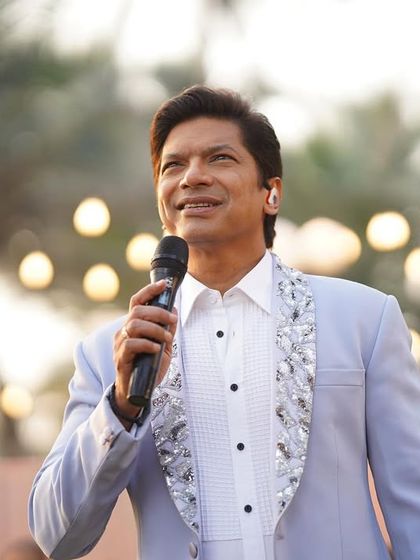 A close-up of Shaan during his performance for Saregama, highlighting the detailed sequin work on the blazer I styled for him.