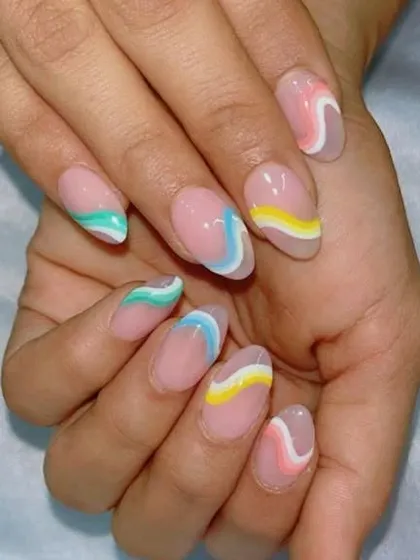 Another view of the playful pastel wave nails.