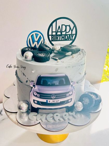 Zooming into another year of adventures with this Volkswagen-themed cake.